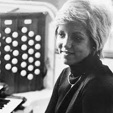 Paula Pugh Romanaux '74, plays the Aeolian-Skinner Organ found in Annie  Merner Chapel. The organ was dedicated to MacMurray College