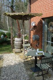 Sonnenschirm Aus Naturmaterial Gefertigt Karin Urban Naturalstyle Garten Ideen Hinterhof Diy Garten Sonnenschirm