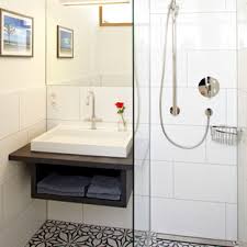 'we used the tiles only where needed to protect the walls and floors where they come into direct contact with water,' explains malcolm abela sciberras, interior designer, rebirth at cuschieri architects. Small Bathroom Floor Tile Houzz