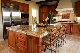 Adding even more practical function to this bright yellow cooking space is the kitchen island topped off with a maple butcher block countertop. Modern Kitchen Designs With Oak Cabinets