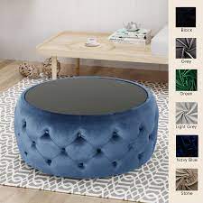 Armaan Coffee Velvet Ottoman Table Lifestyle Home Accessories and coffee table books.