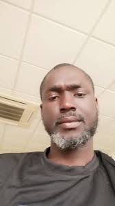 Can anyone clean up this photo of the guy in blue?