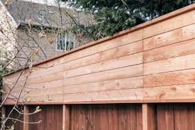 You can plant it near the fence and at its peak it can add a feet or two in height. Diy Horizontal Privacy Fence A Cedar Fence Extension Project Rain And Pine