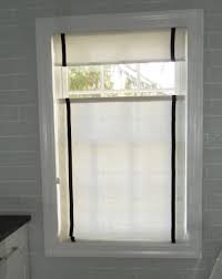 Black And White Roman Shades Crisp White Roman Shade With S Sons Black Tape Trim Top Down Bottom Up Gives Privacy And Lets The Sun Shin Classic Curtains Curtains White Roman Shades