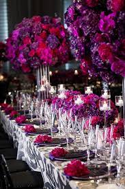 Modern Rooftop Wedding In Rich Jewel Tones Fuchsia Wedding Wedding Floral Centerpieces Wedding Flower Arrangements