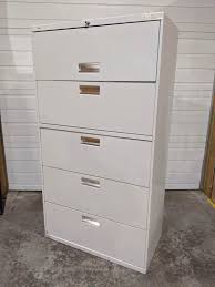 When your office goes through a lot of paperwork on a regular basis, it's important to have an easy way to organize it all. Hon Putty Metal 5 Drawer Lateral Filing Cabinet 36 Inch Wide Hon