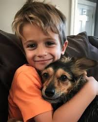 Taz dragging in my bathrobe.