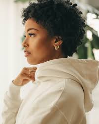 I would be lying if I said I wasn't still super self-conscious about my  hair, but me and my curls are getting there 😏 #heyraychh Set by  @sheilathedesigner 📸: @devinfromchicago