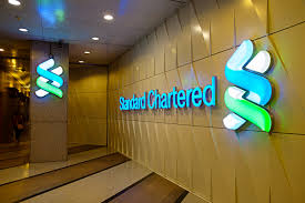 In 1969 two banks ('the chartered bank of india, australia and china' and 'standard bank of british south africa') were merged to make the establishment 'standard chartered bank'. Standard Chartered Bank Coindesk