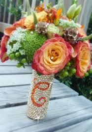 Wedding bouquet charm created with swarovski crystals, white pearls and a white pearl angel. Wedding Bouquet Ideas Bouquet Handle With Monogram Swarovski Crystals Wedding Bouquets Crystal Bouquet Bridal Bouquet