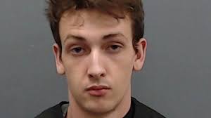 Two men arrested for business break-in, stolen weapons possession