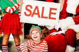 Making christmas shopping for kids more enjoyable and of course, more successful. Copped Shot Fo Kids In Elf Costumes And Santa Holding Sale Banner Christmas Shopping Free Stock Photo And Image