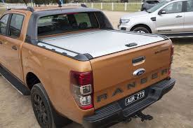 I used 1 square tube and made a frame to fit inside my box then skinned it with sheet alum.then wrapped it in re: Top Tips For Covering The Load In Your Ute Carsguide