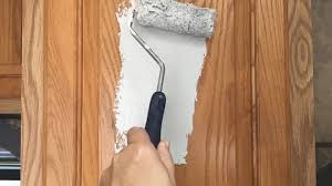 how to paint laminate cabinets without