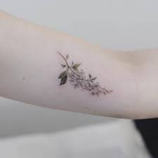 The rose represents love and purity of feelings. 15 Of The Smallest Most Tasteful Flower Tattoos