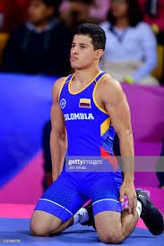Oscar Tigreros Of Colombia Reacts During Wrestling Men S Freestyle 57 Athletic Tank Tops Colombia Freestyle