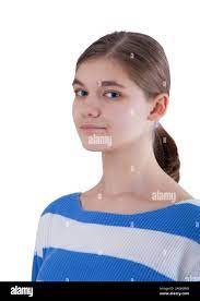 Close-up portrait of an open-necked girl in a blue and white sweater Stock  Photo - Alamy