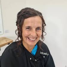 Deborah Peterson Hair added a new...