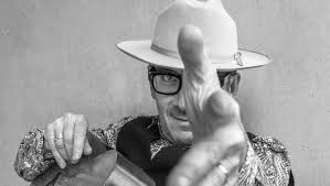 With steve nieve's organ work and bruce thomas' busy bass, costello's guitar is pushed to the back, and the record is much more idiosyncratic and vital than with the generic clover. Elvis Costello 20 Best Albums My Aim To The Roots