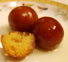 Indian Dessert Gulab Jamun Cheese Balls In Sugar Water Nicer Than It Sounds Gulab Jamun Recipe Jamun Recipe Milk Powder Gulab Jamun Recipe
