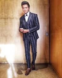 Riteish Deshmukh Biography Height Life Story Super Stars Bio After the release of masti, he changed his name riteish deshmukh for numerological reasons. riteish deshmukh biography height