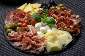 An antipasto salad is filled with sliced meats, soft cheeses, green and black olives with bright red cherry tomatoes that is. Antipasto Platter Tips 14 Ideas For The Perfect Antipasti Platter Tutorial