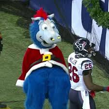 He is an anthropomorphic blue horse who wears a white colts jersey with a horseshoe on the front. Colts Mascot Is Using Pelvic Thrusts To Intimidate The Texans Sbnation Com