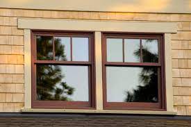 The white trim on dark blue really accents the architectural features. Craftsman Style Double Hung Windows Craftsman Exterior Window Trim Exterior Craftsman Style House