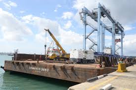The port's commissioning marks the completion of the first three berths at a cost of $367 million, but industry. F Uacuuknhqtam