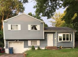 I'd like to show off my husband hard work. He put new windows a new front  door and the siding we did hire someone to do the stone.