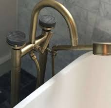 Buying a free standing tub filler faucet can be a little tricky. Floor Mounted Bathtub Faucets The Perfect Addition To A Freestanding Tub Watermark Designs