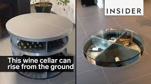 This Hidden Wine Cellar Comes Out Of The Ground Wine Cellar Wine Cellar Design Home Wine Cellars