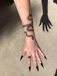 Snake arm sleeve tattoos snake wrapped around arm tattoo 2018 with proportions 1080 x 1280. Snake Tattoo Snake Tattoo Tattoos Thin Line Tattoos