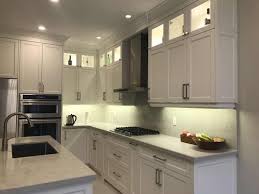 2 door glass cabinet with access from front and back (interior will the match wood type and finish chosen for the face of the cabinet). Modern Kitchen Featuring L Shape Design And Upper Glass Door Cabinets Fengfa Kitchen Cabinets Bathroom Vanities Richmond Hill Markham