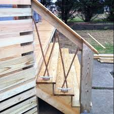 Cable railings (also known as cable railing systems and wire rope railings) are a low maintenance alternative to traditional wood or metal railings. Deck Railing At Out House Outdoor Stair Railing Outdoor Stairs Railings Outdoor