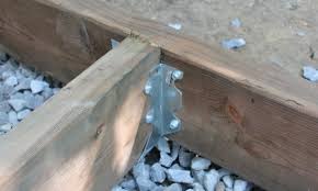 The joists are supported by the hangers, which are themselves fastened to the ledger boards. Joist Hangers Vs End Nailing Vs Toe Nailing For Deck Which Is Better