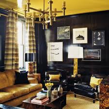 While dark shades of green such as emerald can become a touch overwhelming, gorgeous lighting and matching decor can create a sense of opulence. Black And Gold Living Room Ideas Photos Houzz