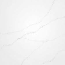 Here is my sample compared to actual island counter: Carrara Venatino Quartz Coast To Coast Kitchen Bath