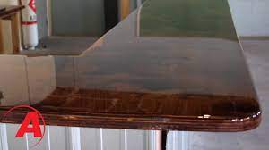 Some people will glaze over surfaces coated with a polyurethane, but i would not recommend this due to the lack of adhesion and long term wear. Pour Your Own Clear Epoxy Bar Coating Alumilite Youtube