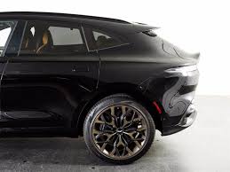 Image result for Marron Black 2021 Aston Martin
