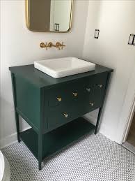 green vanity, green bathroom