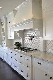Maybe you would like to learn more about one of these? Beautiful Kitchen Idea With Colonial White Granite White Arabesque Tile White Cabinets And White Kitchen Interior White Kitchen Design Kitchen Remodel Small