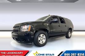 Image result for Black Granite 2012 Suburban