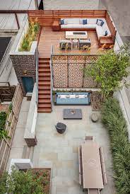 Urban Outdoor Retreat Multi Level Outdoor Entertaining Space For A City Home By Mia Rao Design Lookbo Rooftop Terrace Design Rooftop Design Terrace Design