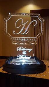 Wedding Ice Sculpture With Bride Grooms Initial And Names Ice Sculptures Ice Sculpture Wedding Wedding
