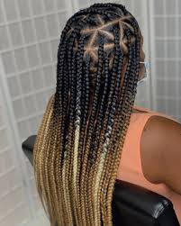 Curly mohawk and braided hairstyle. 35 Cute Box Braids Hairstyles To Try In 2020 Glamour