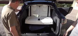 Posted on july 11, 2017. Tesla Model Y Third Row Seat Test Explores Options For A Comfortable 7 Seat Setup