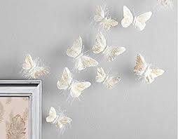 Metallics aren't going anywhere, and they're going to be especially big in children's rooms this year. Amazon Com Inspired By Jewel Butterfly Wall Decorations Premium Quality Real Feather 3d Wall Decals Girls Bedroom Stunning Gold Glitter Decor Stickers All Rooms Nursery Sets 10 Adhesive Pieces Home