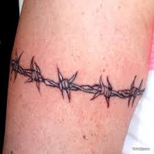 Bird On A Wire Tattoo Meaning Barbed Wire Tattoos Pictures Video Information On Barbed Wire Tattoos Tattoo Creatives Barbed Wire Tattoos Picture Tattoos Tattoos