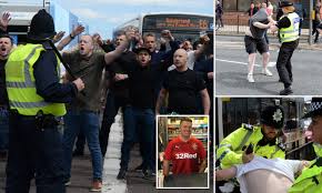 He was attempting to confront a rangers fan in a red coat, who was also pushed back by police. Sunderland And Celtic Fans Clash Before Match Daily Mail Online